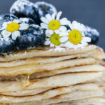 Blueberry Buttermilk Pancakes heather barnes f2dr5aplxx4 unsplash scaled